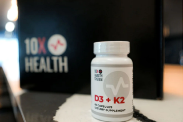 10X Health D3 + K2 supplement bottle placed on a counter with a branded 10X Health box in the background.